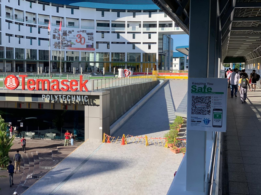 Pedestrians accessing Temasek Polytechnic campus via Overhead Bridge and Audi Foyer