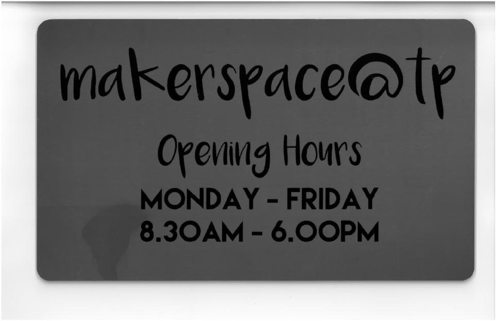 Makerspace@tp (Library) <em>opening</em> hours : signage